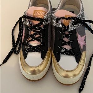 New Golden Goose shoes. They are size 8.5